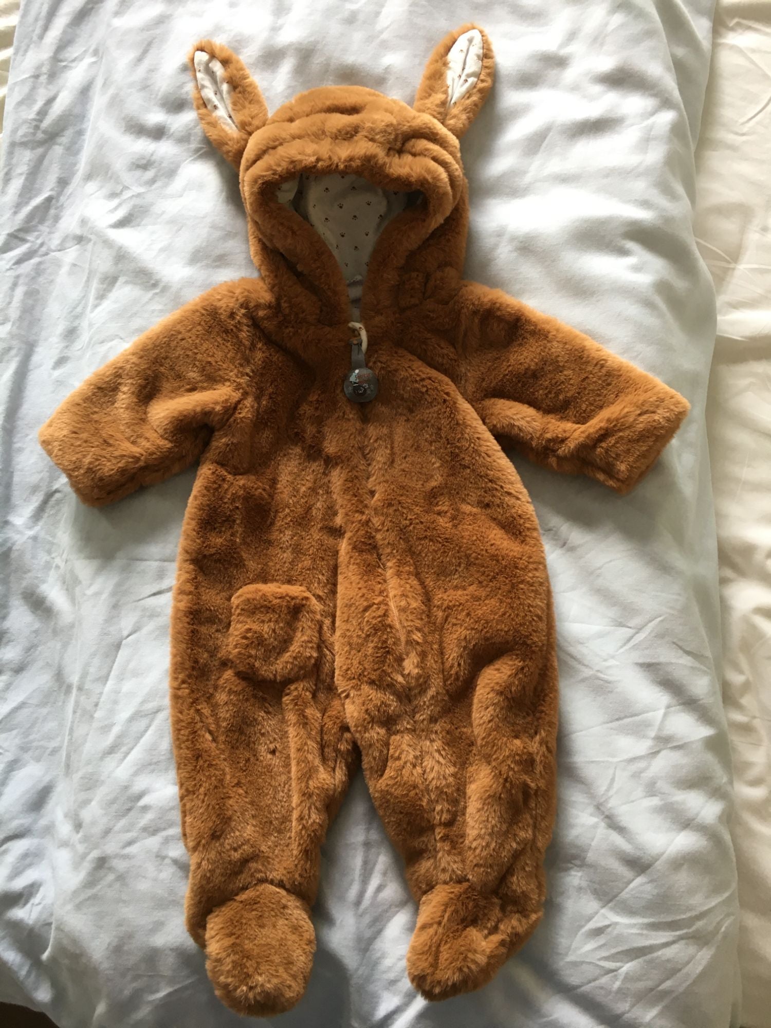 Combinaison bébé lapin sale